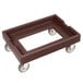 A brown Cambro pizza dough box dolly.