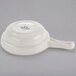 A Tuxton eggshell white china casserole bowl with a handle.