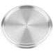 A close-up of a Vollrath stainless steel pot lid with a loop handle.