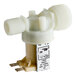 A white plastic Moffat solenoid valve with a plastic plug.