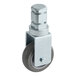 A metal caster wheel with a grey rubber tread and a metal post.