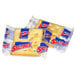 A Lance Saltine cracker in a plastic wrapper with a red and blue label.