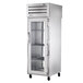 A True stainless steel pass-through refrigerator with glass doors.