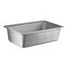 A Vollrath stainless steel transport pan with a lid on a counter.