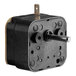 A Moffat bake timer with a metal rod and small gear on it.