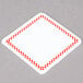 A white square Ketchum Manufacturing deli tag with a red checkered border.