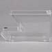 A clear plastic Cal-Mil stackable topping dispenser with a clear plastic holster.