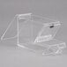 A Cal-Mil stackable topping dispenser with a clear plastic box and lid on a counter.
