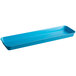 A blue rectangular Cambro fiberglass market pan with handles.