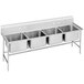 A stainless steel Advance Tabco four compartment pot sink.