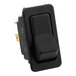 A black switch with a black button.