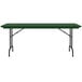 A green rectangular Correll folding table with black legs.