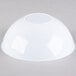 A white bowl on a gray background.