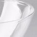 A close-up of a clear Fineline plastic bowl.