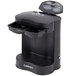 A black Conair Cuisinart coffee maker with a lid open.