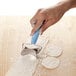 a person using a dough cutter to make dumplings