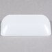 A white rectangular Fineline Tiny Temptations plastic tray.