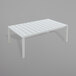 A white table with metal legs.