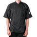 A man wearing a black Mercer Culinary chef coat.