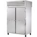 A True stainless steel reach-in refrigerator with a solid front and glass back.