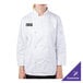 A person wearing a white Mercer Culinary long sleeve chef jacket with the word "zs" on it.