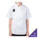 A person wearing a Mercer Culinary white short sleeve chef jacket.