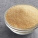 A bowl of Golden Barrel cane sugar on a table.