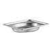 A silver stainless steel Vollrath oval pan.