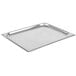 A Vollrath stainless steel 1/2 size steam table pan cover with a handle.