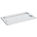 A Vollrath Super Pan 3 stainless steel 1/3 size cover on a tray.