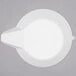 A white plastic scoop with a spout.