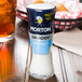 A Morton sea salt mill on a table.