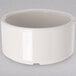 A Carlisle ivory bone ramekin on a white surface.