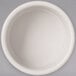 A Carlisle ivory bone melamine ramekin on a white surface