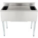 A stainless steel Eagle Group underbar cocktail and ice bin with bottle holders and a cold plate on a counter.