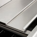 A stainless steel Eagle Group underbar cocktail / ice bin with post-mix cold plate and bottle holders on a counter.