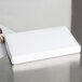 A white rectangular 2-piece candy box on a white surface.