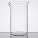 A clear glass Libbey French press carafe with a handle on a table.
