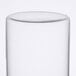 A close-up of a clear glass Libbey French press carafe.