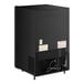 A black rectangular True countertop refrigerated merchandiser with a vented black door.