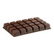 A close-up of a brown 24-cavity candy tray with squares of chocolate in it.