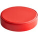 A red round vinyl cushion for a bar stool.