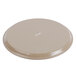 A brown circular Thunder Group fiberglass non-skid serving tray.