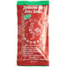 A white bag of Huy Fong Sriracha hot chili sauce packets with red and green packets inside.