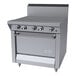 A commercial stainless steel hot top range with three sections, four control knobs, and a standard oven below.
