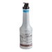 A close up of a Monin Blueberry Fruit Puree bottle with a black lid.