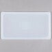 A white rectangular Flexsil lid.
