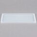 A white high-heat silicone lid on a rectangular food pan.