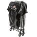 A black Rubbermaid laundry bag on a cart with wheels.