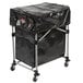 A black plastic cart with a black cover.